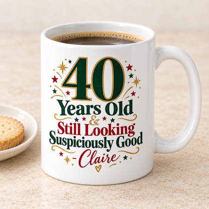 Still Looking Good white 11oz ceramic mug with sample personalisation, elevated three-quarter view