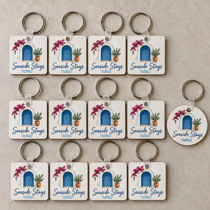 Bulk order of matching branded promotional keychains in square and round shapes