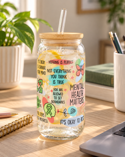 Mental health awareness glass tumbler styled on a home office desk