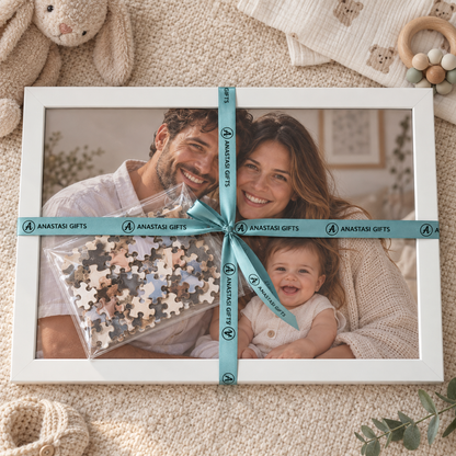 Personalised baby and family photo puzzle with white frame and Anastasi Gifts ribbon