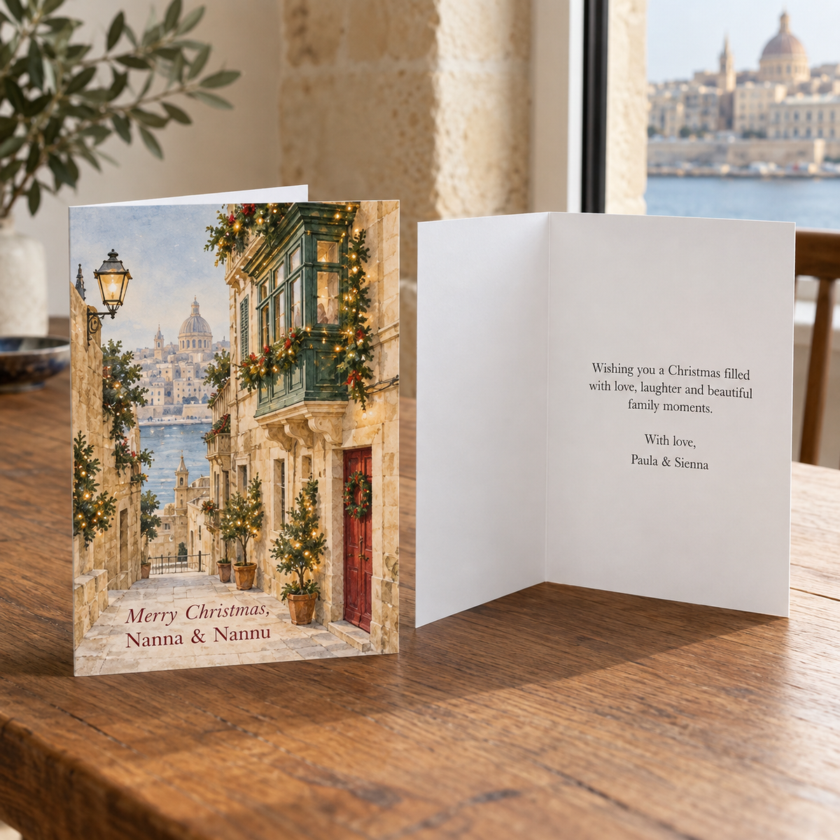 Personalised Maltese family Christmas card showing the front and inside message